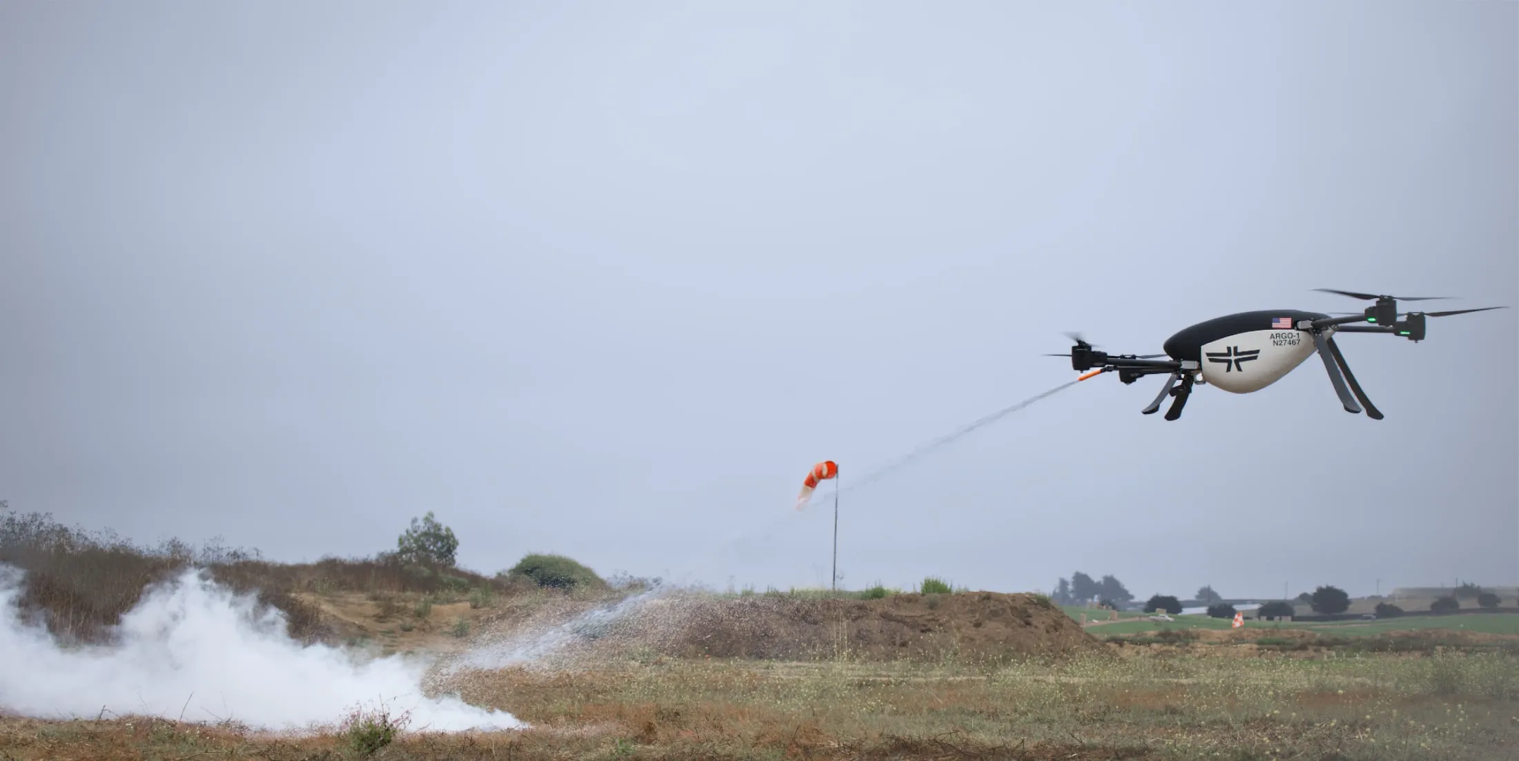 Aerial vehicle suppressing a grass fire